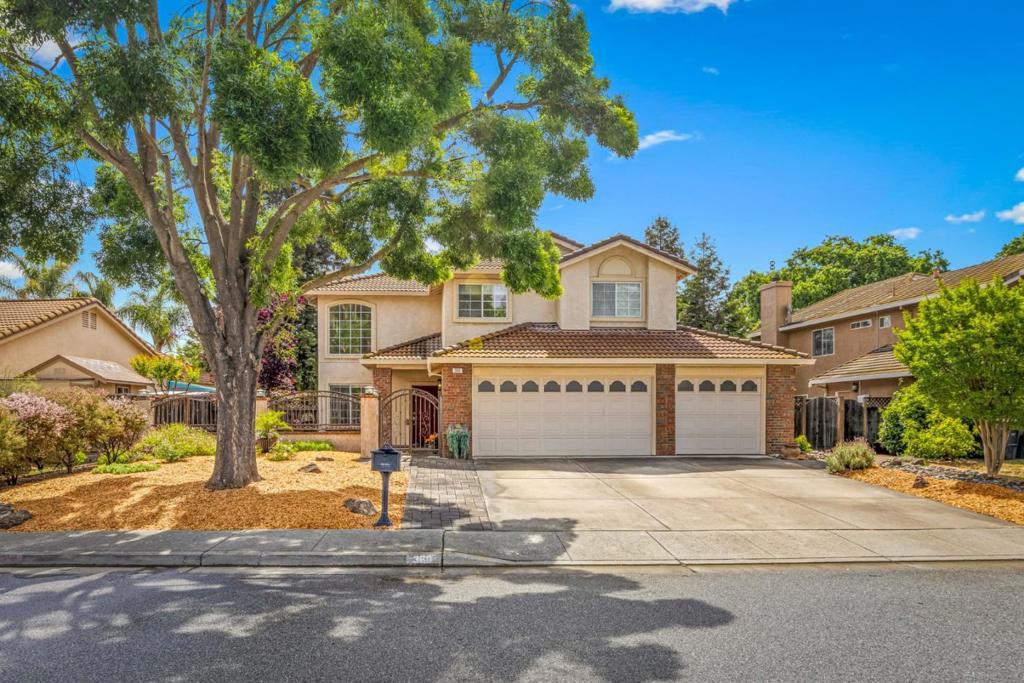 Location, Location, Location in the highly sought-after Mill-Creek neighborhood, this beautifully maintained home offers comfort, style & neighborhood views. One of the best priced 5bdrm, 3bath with a bottom floor bedroom & full bath located on Westside of Morgan Hill. Be Welcomed to high ceilings & cozy fireplace that centers you into the heart of the home. The updated kitchen is a chef's delight, featuring brand-new cabinets, a modern sink & faucet, soft-close drawers, quartzite countertops, stylish backsplash, blending efficiency with high-end design. The main bedroom boasts a generous walk-in closet complete with built-in drawers/cabinets, & a luxurious ensuite bathroom featuring a granite shower enclosure, matching granite sink, surrounding windowsills, and heated flooring. The hallway upstairs bathroom has also been tastefully updated with new tile floors & granite countertops, as well as double sinks. Low-maintenance backyard featuring artificial grass, garden beds, & expansive side yards. Large courtyard in front provides a private & inviting space for entertaining or relaxing facing NW. Nearby paved trails to schools, parks, stores or just exercise. The garage includes workbench & some cabinets, offering ample space for projects and storage.