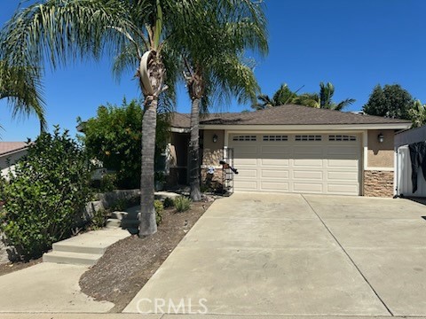 Beautiful 3 bedroom, 2 bath single-story home on large lot with RV parking. Home features an extra large living room with ceiling fan, laminate floors and crown molding. Beautiful Italian style ceramic tile flooring as you enter the home and in the kitchen and baths. Kitchen has granite counter tops, recessed lighting, stainless steel appliances including refrigerator. Family room has fireplace and ceiling fan. Primary bedroom has walk-in closet with a full En-suite bathroom. As you exit your family room through the glass sliding door you will enter an outdoor kitchen area under a covered patio. The backyard has an additional covered patio area that you will enjoy. Nice quiet neighborhood. Chino Valley Unified School District.