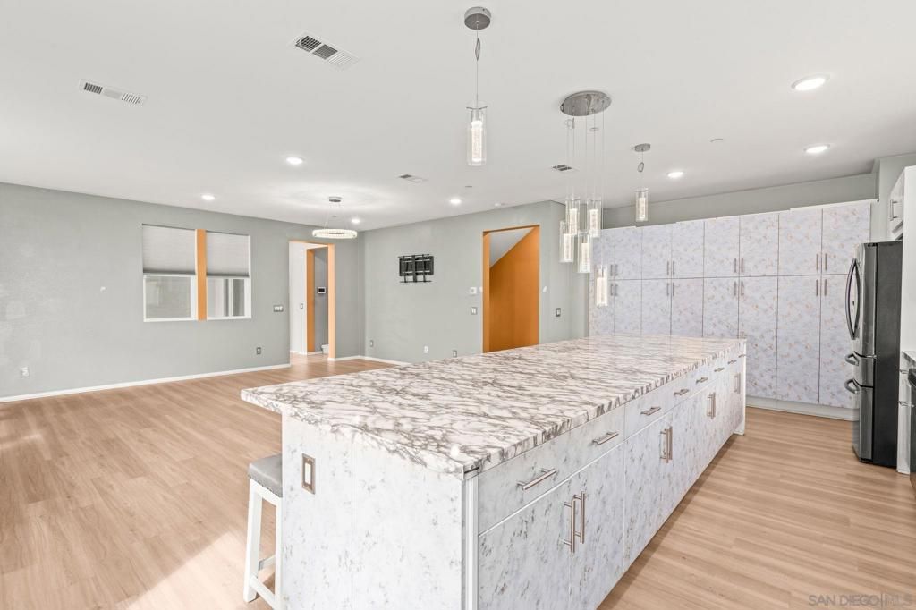 Photo of 5361 Calle Rockfish #68, San Diego, CA 92154 (MLS # 250042362SD)