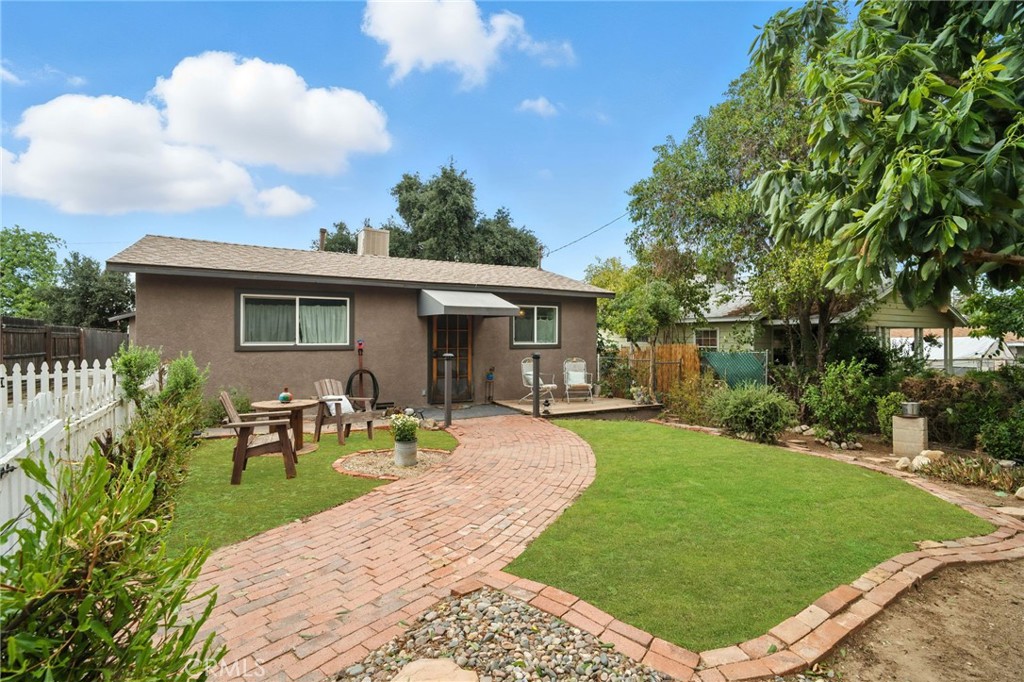 Welcome to this Upper Yucaipa gem! 35263 Beech offers two homes on one lot—a rare find perfect for extended family living or investment opportunities.
The front home features 2 bedrooms and 1 bath with a light-filled, spacious family room enhanced by new windows, recessed lighting, and a ceiling fan. The family room flows into a charming dining area with built-in cabinetry and custom ceiling details. The upgraded kitchen showcases newer appliances (refrigerator included in both units), a farmhouse sink with matte black fixtures, and butcher block countertops. Enjoy your morning coffee on the welcoming front patio or host gatherings in the private backyard—ideal for BBQs or play.
The back home (studio) is thoughtfully designed with an open floor plan, a cozy living/sleeping area, galley kitchen with space for a breakfast table, and a stylishly updated full bath.
The property is fully gated and features a manageable garden, a large storage shed (workshop, playhouse, or she-shed/man cave), plus alley access for the back unit, RV, or trailer parking. There is a seperate laundry room/ individual room that both units have access to.
This rare front-home/back-home setup offers endless potential and is move-in ready!