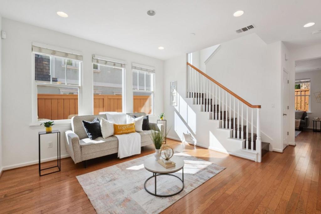 Step into this beautifully updated and spacious 5-bedroom, 3.5-bath home, filled with natural light and thoughtfully designed for both comfort and style. Freshly painted inside and out with newly refreshed landscaping and an upgraded side fence, this home features gleaming hardwood floors, recessed lighting, and a stunning kitchen with abundant cabinet space, stainless steel appliances, gas stove, built-in microwave, and a large center island perfect for entertaining. The gas fireplace adds warmth and charm, while owner-owned solar helps with energy efficiency. The versatile third floor functions as a second ensuite with a tastefully permitted full bath, ideal for guests or multigenerational living. Enjoy modern conveniences like ceiling fans, a laundry room, water softener system, dual vanity and soaking tub in the primary suite, custom closets in every room, and a two-car garage with built-in cabinetry for extra storage. With easy access to major highways and top tech companies, this home offers the perfect blend of luxury, functionality, and location.