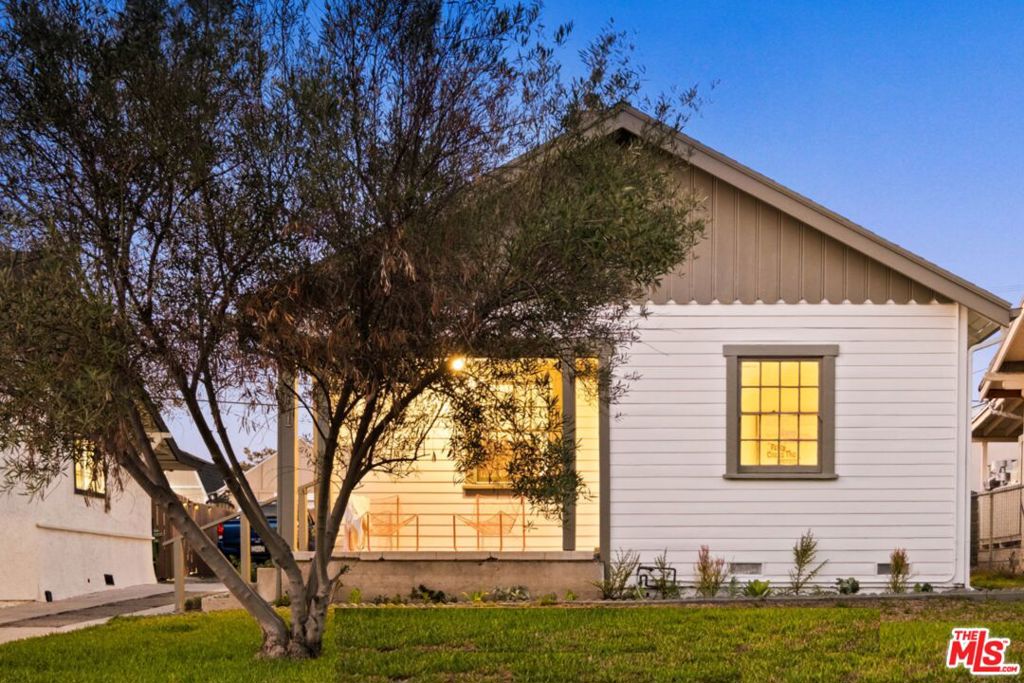 Built in 1923, this California bungalow celebrates its history while embracing modern life. Original hardwood floors and period details set the stage, while an open layout connects seamlessly to a stainless-steel kitchen with farmhouse sink and subway tile. The bath balances vintage charm, original tile and built-in's with crisp white hex tile and a chic mirror. But 5051 Buchanan isn't just a home and asset, it's a whole lifestyle. With three bedrooms, light-filled living spaces, and a backyard retreat shaded by a mature tree and anchored by a patio and lime tree, the home flexes to fit your needs. Afternoons turn into al fresco dinners, weekends into gatherings, and there's even room for a pool, swing sets, garden boxes or dog heaven. The design extends beyond the main house: a finished detached garage with HVAC and glass sliders invites reinvention: music studio, art lab, home office, gym, or income-producing ADU? It's architecture that evolves with you. And the setting? Think NYC's East Village energy meets L.A.'s sunshine. London grit and charm meets California ease. Seattle in the '90s, when the music scene made every night electric, creatives with kids, diversity, community - that's today's Highland Park. Steps from York Boulevards' restaurants, cafes, York Park, Bob Baker's, venues and bars (WalkScore 90), you can live car-lite or car free and own your own creative sanctuary. This is the best of New York and Los Angeles combined - urban energy, neighborhood soul, and a home with enduring character that will fit your needs for decades to come.
