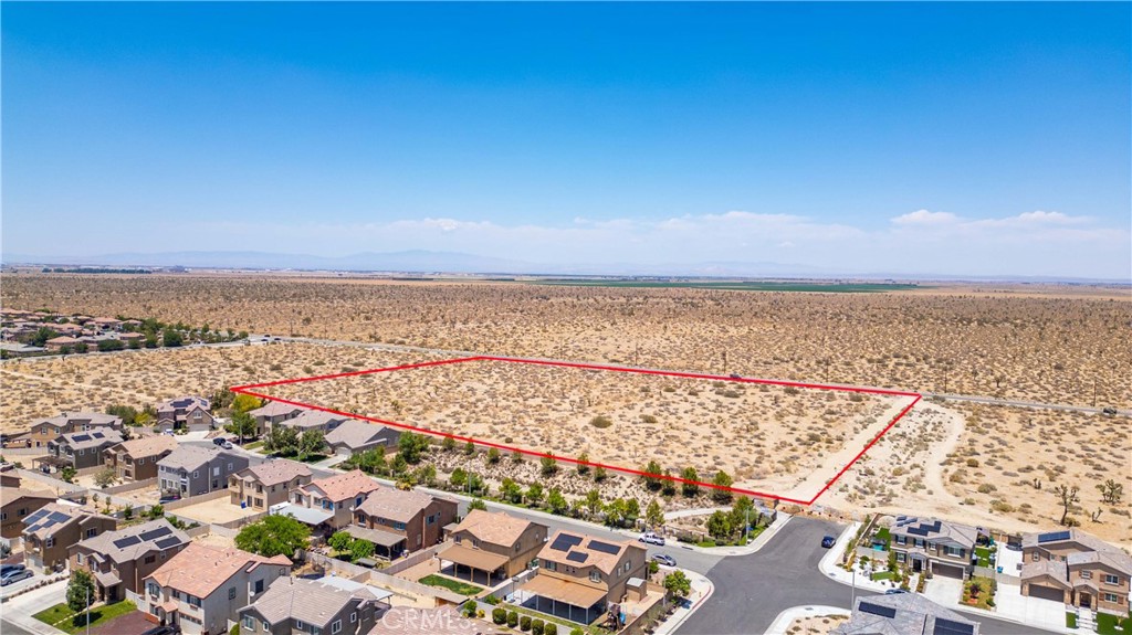 Over 9 acres of land that is right off Palmdale Blvd. This parcel of land is conveniently located, near other housing track developments and close to schools, parks, shopping, etc.