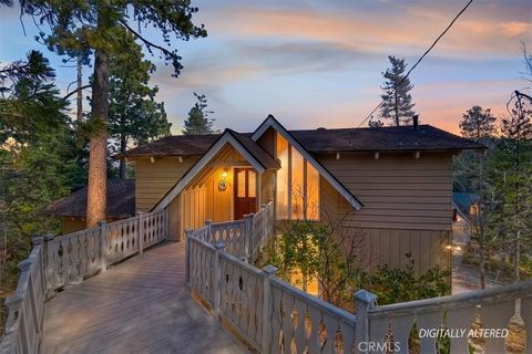 Photo of 26599 Placer Ln, Lake Arrowhead, CA 92352 (MLS # IG26050299)