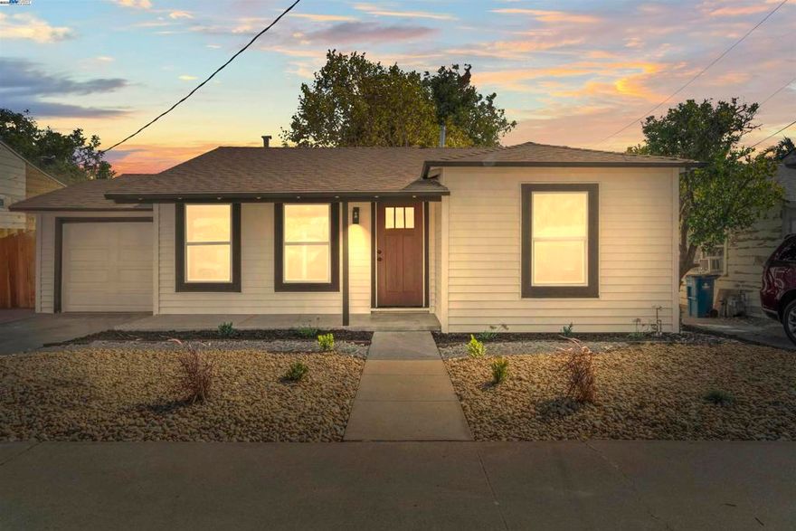 Welcome to this beautifully updated 2-bedroom, 1-bathroom home offering 843 sq. ft. of living space on a spacious 5,000 sq. ft. lot. Perfectly blending modern updates with classic charm, this home is move-in ready and ideal for first-time buyers or small families. Step inside to a large, inviting living room highlighted by a stunning fireplace—the perfect spot to relax or entertain. The dining area offers an intimate setting, while the gorgeous kitchen boasts butcher block counters, a farmhouse sink, new appliances, and ample cabinet space—a true chef’s delight. Natural light pours in through the double-pane windows, complemented by recessed lighting that creates a bright, warm atmosphere throughout. Both bedrooms are generously sized and versatile, while the bathroom features subway tile, a modern vanity, and spa-like finishes. Enjoy California living in the expansive backyard, shaded by mature trees and offering endless potential for gardening, entertaining, or simply relaxing outdoors. Located just moments from schools, dining, and shopping, with quick access to Highway 4, this home is as convenient as it is charming.