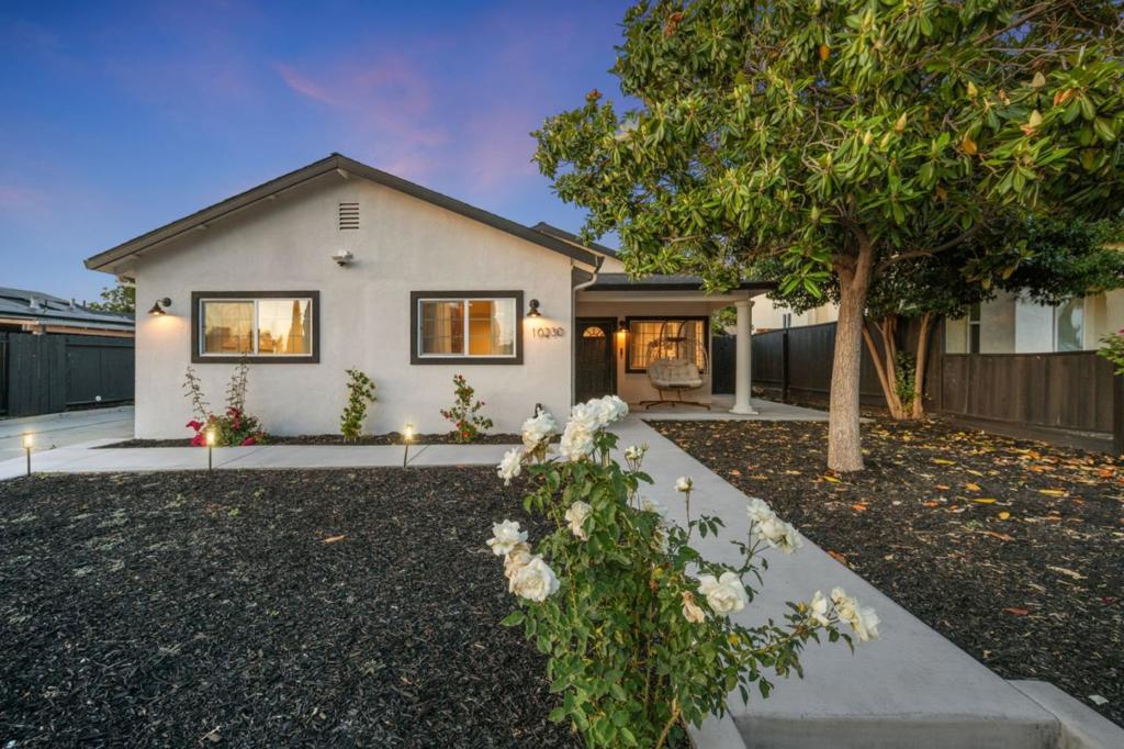 Welcome to this beautifully updated home in one of San Jose's fastest-growing neighborhoods. Step inside to discover luxury vinyl plank flooring throughout and a completely remodeled kitchen featuring quartz countertops, stainless steel double ovens, premium new appliances such as the LG smart fridge with knock-to-view window and the space-saving LG WashTower with stacked internet-enabled washer and dryer combo. Modern conveniences include Nest thermostat, Yale keyless entry locks, and adjustable LED lighting. The flexible layout offers both a cozy family room (converted from garage w/ permits) and spacious living room, perfect for any lifestyle. Both bathrooms are tastefully renovated, with the primary suite featuring double vanity and sleek stall shower. A brand-new Carrier heat pump ensures year-round energy-efficient comfort. Outside, enjoy eco-friendly low maintenance landscaping, newly poured concrete rear patio, gated driveway for RVs or oversized vehicles, and a Level 2 Tesla charger. Perfectly located minutes from Alum Rock and Mount Pleasant Parks, premier shopping, and major tech employers including Cisco, Adobe, and PayPal. Don't miss this move-in ready gem in one of Silicon Valley's most desirable areas. Schedule your showing today!