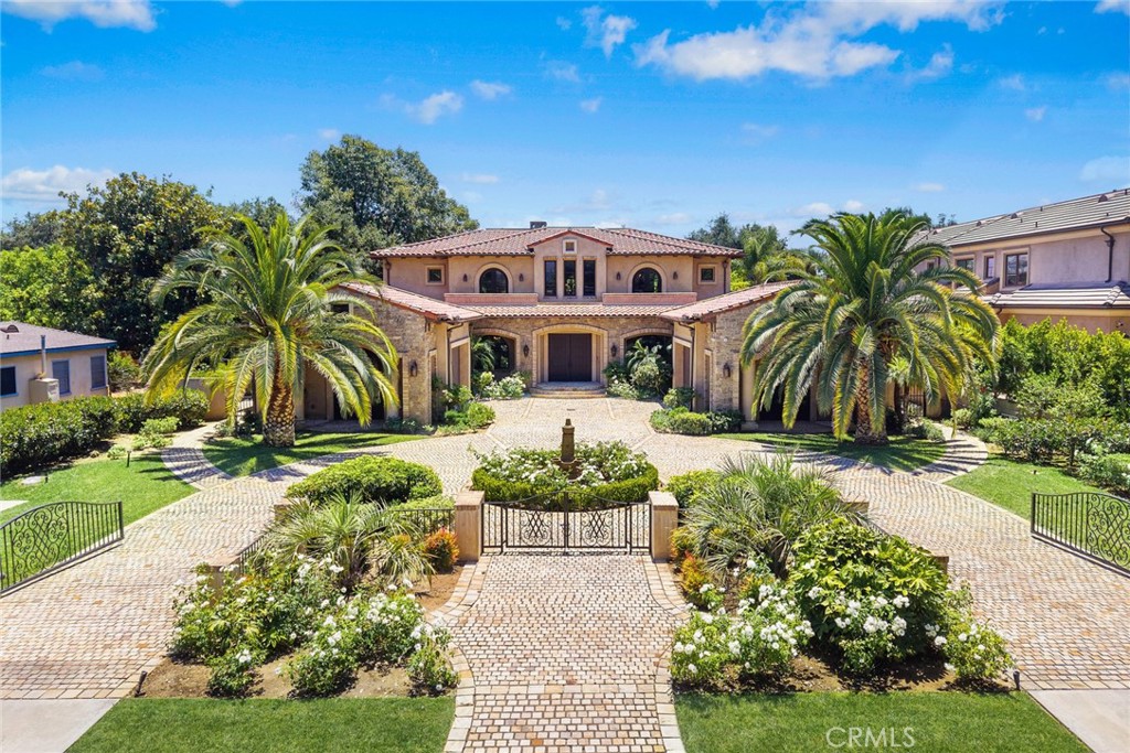 Rare opportunity to own one of the largest lots in the prestigious Baldwin Stocker school area of Arcadia!
This custom-built luxury home, originally constructed in 2012 and recently renovated with numerous upgrades, offers unparalleled elegance and space. Behind an automatic gated driveway, the home features 2 master suites, 5 additional suites, and a maid’s suite.
The first floor is a sanctuary of luxury, complete with a custom home office library, an elegant theater, a serene study room, a refined cigar lounge, and a tranquil massage room with a private shower. The expansive living room, centered around a cozy fireplace, flows into a stunning formal dining room. A wine cellar and open wet bar enhance the home's sophisticated charm, making it ideal for entertaining.
The gourmet kitchen boasts a spacious open floor plan, top-of-the-line appliances, and a separate wok kitchen. Ascend the intricate staircase to find the grand master suite, complete with a private retreat, a massive walk-in closet, and a luxurious master bathroom.
The beautifully landscaped garden, surrounded by lush trees and shrubs, offers a serene escape for outdoor gatherings. Located just minutes from top-rated schools, golf courses, parks, restaurants, and the renowned Santa Anita Race Track.
Schedule a private tour today and experience this extraordinary masterpiece!