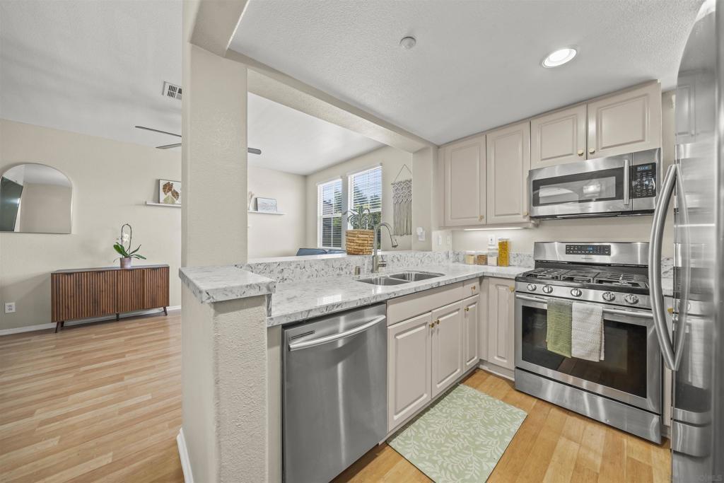 Beautiful 2 Bed / 2.5 Bath Townhome in Ocean View Hills – FHA & VA Approved! Welcome to your new home in the highly desirable, fully gated community of Spinnaker Point in Ocean View Hills! This bright and spacious 2-bedroom, 2.5-bathroom townhome is perfect for first-time buyers or growing families looking for a move-in ready home in a well-maintained neighborhood with resort-style amenities. Inside, you'll find a functional and inviting layout featuring a full kitchen, in-unit washer and dryer, and ample living space. Upstairs, two generously sized bedrooms each offer comfort and privacy, complemented by two full bathrooms and an additional guest half-bath downstairs. Enjoy the convenience of an attached one-car garage, plus an extra reserved parking spot and plenty of guest parkingthroughout the community. The grounds are beautifully maintained by a low HOA, giving the neighborhood a clean and serene feel year-round. Spinnaker Point is FHA and VA approved and offers exceptional amenities including a resort-style pool and relaxing spa, perfect for unwinding on warm Southern California days. Don’t miss this amazing opportunity to own in one of South San Diego’s most sought-after communities!