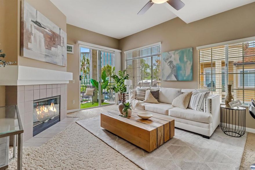 Your PENTHOUSE awaits! Welcome to this rarely available TOP FLOOR, SOUTHWEST facing, CORNER UNIT, offering green canyon VIEWS, and situated in one of Mission Valley’s most desirable communities - River Colony! Step inside to an inviting open layout featuring luxurious porcelain tile flooring, an upgraded kitchen with stainless steel appliances, and a cozy fireplace for those chilly evenings! Be amazed by an abundance of natural light from multiple windows that brighten every space, complemented by custom blinds, including room-darkening shades in the primary bedroom. Both bathrooms have been tastefully updated, and each room includes ceiling fans for added comfort. Enjoy the convenience of your own PRIVATE WASHER and DRYER, a recently maintained HVAC system, wired internal alarm system, and TWO assigned side-by-side parking spaces in the gated underground garage. A Ring doorbell, Google Nest thermostat, and BBQ grill adds extra value and modern convenience. River Colony residents enjoy resort-style living with access to a sparkling pool and spa, a fully equipped fitness center, a clubroom, and a Wi-Fi lounge, all maintained by a well-managed HOA. Ideally located near San Diego’s best shopping, dining, and trolley access, this home offers the perfect combination of comfort, style, and convenience. Don’t miss your opportunity to make this beautiful top-floor retreat yours, just in time for the holiday season!