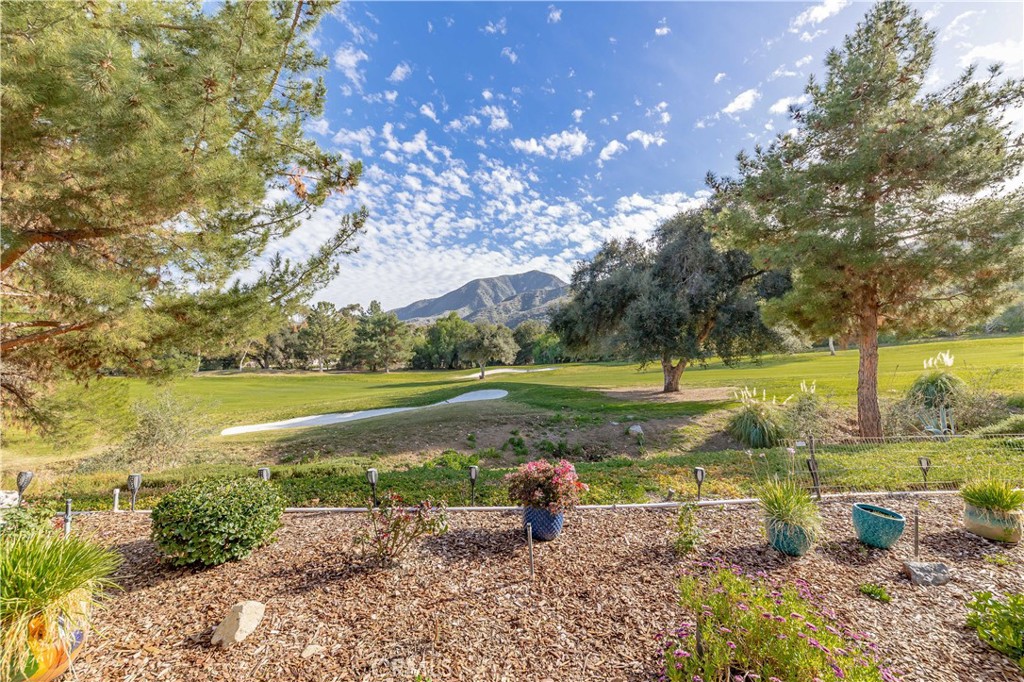 Beautiful Glen Ivy Golf Course VIEW Home that sits on the 7th fairway in the desirable 55+ gated community of Trilogy, QUIET & PRIVATE. Great Location, absolutely one of the BEST Views and locations in Trilogy. This upgraded home is in pristine condition, move-in ready, almost 1600 sq. (approx. 1578 sq ft.) Featuring PAID OFF SOLAR lease WITH BACK UP BATTERY and a water softener system. OPEN FLOOR PLAN, Gourmet kitchen with granite counters, newer SS appliances, maple cabinets, New Farm House Sink, chef’s island with bar seating which opens up to the great room Wood Flooring and a private courtyard. Golf course views & Mountain View’s from the great room & primary bedroom. Builder optional extended master bedroom walk-in closet for added space and features closet organizer and Builder option extended laundry room providing a built in sink. The Primary and Guest suite are nice sized, a flex room which is currently used as an office. Enjoy the view of the golf course & Cleveland National Forest from your outdoor patio with New maintenance free Alum wood patio cover, Self watering garden. Bosh refrigerator, washer & dryer included. Front Yard Maintenance is paid by HOA. Trilogy is an active 55+ adult community surrounded by the Glen Ivy Golf Course and the Cleveland National Forest with many wonderful facilities, such as indoor and outdoor pools, hot tub, BBQ's, tennis courts, state of the art gym, indoor walking track, exercise classes, ballroom, amphitheater, pickleball, bocce ball, arts & crafts center, billiards room, WIFI, dances, dinners, Bistro by the pool & many social opportunities and clubs. All of this near Lots of shopping, the Glen Ivy Hot Springs Spa. This is True Resort Style Living at its Fullest. Sellers welcome all reasonable offers.