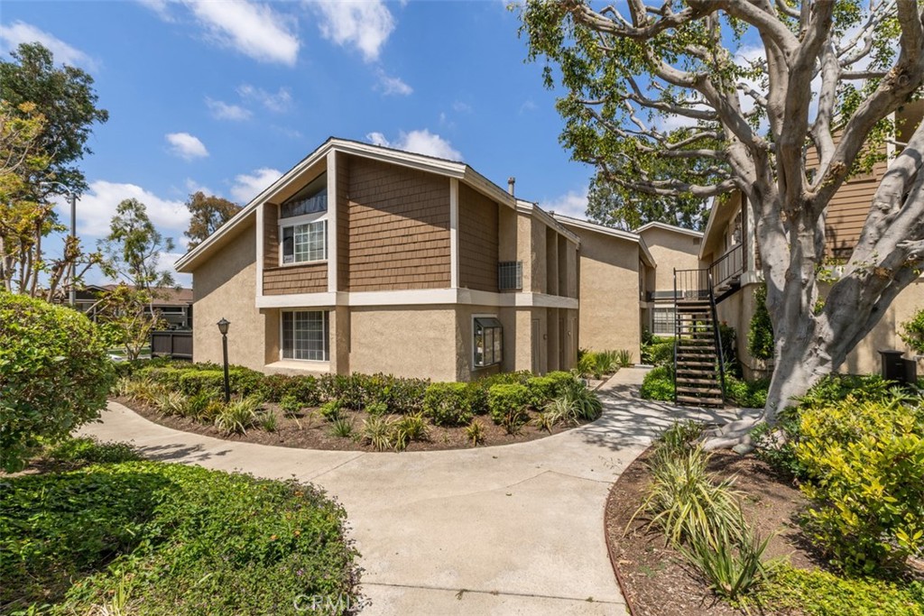 Secure Rental Income from Day One in Irvine! This upgraded 1-bedroom townhome with a separate office or den is located in The Lakes—a peaceful community surrounded by mature trees, flowing streams, and scenic walkways. The property is currently leased through June 30, 2026, with reliable tenants paying $2,725/month, providing immediate cash flow with an estimated cap rate of approximately 3.82%, based on actual income and expenses. Market proforma rent is approximately $2,900/month, offering solid rental upside over time.
The unit offers the advantage of no neighbors above or below and the bonus of a rare fenced patio with upgrades like a retractable awning, stone pavers, and raised planter boxes. Inside, the home features a remodeled kitchen with quartz countertops and stainless steel appliances, both bathrooms remodeled with plenty of storage, and elegant touches like recessed lighting, ceiling fans, crown molding, paneled wainscoting, paneled doors, two-tone paint, completely remodeled interiors, hardwood flooring, and wrought iron stair railings.
Additional highlights include energy-efficient central heating and air conditioning, dual-pane windows, and a full suite of appliances—refrigerator, washer, and dryer—all of which are included in the sale.
The Lakes community offers exceptional amenities: two pools, two spas, two tennis courts, and lush landscaped paths along tranquil water features. Located within the highly rated Irvine Unified School District, this property is also just minutes from shopping, dining, freeway access, and several scenic trails including Hicks Canyon Trail and the Jeffrey Open Space Trail. There are no Mello-Roos taxes, making this an even more appealing long-term investment.
One assigned covered carport parking space is included, with additional guest and street parking available. HOA dues cover water, sewer, trash, and exterior maintenance—making this an easy-to-manage investment.
Whether you're adding to a portfolio or seeking a turnkey rental in one of Orange County's most desirable markets, this property checks all the boxes.