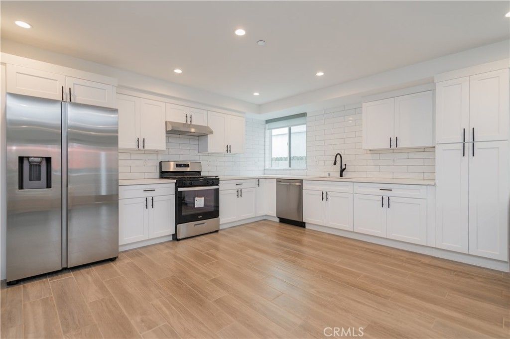 Photo of 5652 La Mirada Avenue, Los Angeles, CA 90038 (MLS # OC25257063)