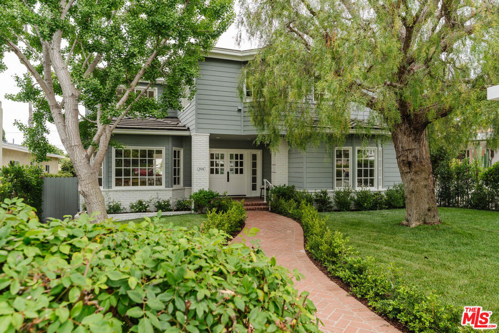Completely reimagined and move-in ready, this beautifully designer-done traditional home sits on one of Santa Monica's most coveted tree-lined streets, just south of Montana. With 5 bedrooms and 5.5 bathrooms across over 3,800 sq ft, the home blends timeless charm with thoughtful, high-end upgrades throughout. Inside, enjoy a bright and open layout featuring formal living and dining rooms, a stunning chef's kitchen with designer finishes, and a spacious family room that opens to the private backyard. Two bedrooms and two baths on the main level offer flexibility, while upstairs includes a serene primary suite and two additional on-suite bedrooms. The backyard is an entertainer's dream with patio space, a pool, a spa, and detached two-car garage. Just moments from Montana Avenue's best shops and cafes and the Brentwood Country Mart , this turnkey gem offers luxury, comfort, and style in a prime Santa Monica location.