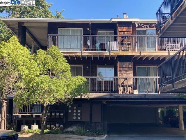Welcome to 1975 Bonifacio Street, a charming upper-floor end-unit condo that offers the perfect combination of comfort, privacy, and convenience. This well-appointed home is located in a secure, gated community and features a spacious eat-in kitchen with a breakfast bar, granite countertops, and elegant maple cabinetry. The open layout is complemented by laminate flooring throughout, central heating and air conditioning, and the convenience of an in-unit washer and dryer. The oversized master closet provides generous storage, while large windows allow natural light to fill the space. Enjoy peace of mind with gated entry and under-building parking, and take advantage of community amenities like the refreshing pool—perfect for relaxing on warm summer days. Just a short walk to the vibrant Todos Santos Plaza, you’ll have easy access to local dining, entertainment, and shopping. With close proximity to major freeways, commuting is quick and easy. This home truly offers a desirable lifestyle in a prime location.
