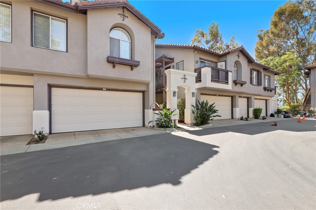 Upper Unit with Expansive Golf Course Views in Rancho Veracruz! Situated in one of Tustin Ranch’s most desirable communities, this highly sought-after upper-level residence offers breathtaking golf course and sunset views from nearly every window. With no one living above, the home combines privacy, natural light, and resort-style living in an unbeatable location. Inside, the popular floor plan features 1 spacious bedroom plus a versatile loft with closet—perfect for a home office, den, or second bedroom. The soaring cathedral ceilings, cozy fireplace, skylight, and abundant windows create a bright, open, and inviting atmosphere throughout. The remodeled kitchen showcases crisp white shaker cabinets, stone countertops, newer appliances, and a breakfast bar, seamlessly connecting to the dining area and living room—an ideal setup for entertaining. The bedroom suite includes a dressing area with an additional vanity, generous counter space, and plenty of storage. Upstairs, the loft offers flexibility and privacy, while the private balcony—accessible from both the living room and bedroom—overlooks the golf course and tree-lined views, providing the perfect space for morning coffee or evening barbecues. Additional highlights include fresh designer paint, full-size stackable washer/dryer, attic access for extra storage, and the rare advantage of no neighbors above. Residents of Rancho Veracruz enjoy two sparkling pools and spas, a fitness center, and a clubhouse for private events. HOA dues cover water and trash, which helps keep costs manageable. Centrally located near Tustin Ranch Golf Club, The Market Place, parks, hiking trails, and top-rated schools, this home blends comfort, convenience, and captivating views. Don’t miss your chance to own this stunning golf course view home in Rancho Veracruz!