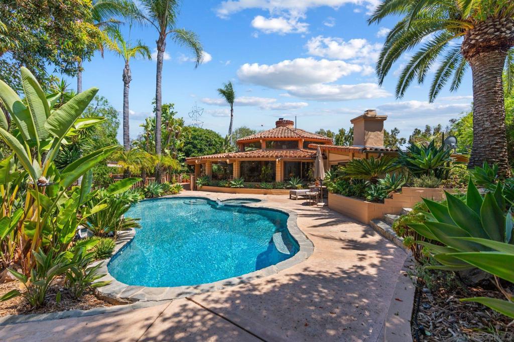 This is an exceptional Rancho Santa Fe value! The unique, well-maintained main residence features a wide open great room with high ceilings and large windows. The outdoor living areas include a vanishing edge pool with a covered cabana measuring over 500 square feet, extensive deck space, four separate seating areas, manicured mature landscaping, a sand volleyball court and even a tree house. In addition to this charming home’s 3 bedrooms and 3 baths, there is a loft office providing light-filled space not included in the square footage, and owned solar! A separate 1 bedroom, 1 bath, 741 square foot ADU with its own entrance and parking area, full kitchen, laundry, living room and a view deck almost as large as the structure was added in 2020. Both homes are sited on 2.98 view acres with plenty of room to add space and enjoy spectacular westerly views and to keep a few horses. Quiet and private, this property is ready to move right in and enjoy, with unlimited potential. The home includes an oversized 3 car garage and an extra-large laundry room. Voluntary HOA of $250/year.
