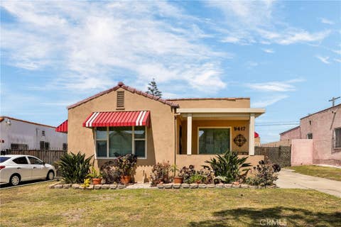 Photo of 9417 S Harvard Boulevard, Los Angeles, CA 90047 (MLS # SB26089417)