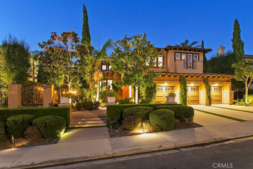 This magnificent 4-bed, 3.5-bath home, in guard-gated Ocean Ranch, delivers a harmonious blend of luxury and tranquility, the 4,005 sq ft estate captivates the moment you enter. A majestic foyer opens to elegant living and dining areas, with bespoke wall treatments, a warm fireplace, and tranquil views of the backyard and pool. Vaulted ceilings in the living room invite natural light, while the dining room’s coffered ceiling and adjustable lighting sets the mood. The remodeled gourmet kitchen showcases a generous island, breakfast bar, imported porcelain flooring, tailored cabinetry, and a Wolf gas range. A bright, inviting breakfast alcove features large windows and distinctive pendant lighting. The adjoining family room, highlighted by an angled fireplace and a chic wet bar, seamlessly integrates with the open layout—creating a perfect backdrop for memorable gatherings. The main floor also offers an en-suite bedroom, powder room, and a spacious laundry room for ultimate convenience. Two staircases—a graceful main staircase and a functional secondary one—ascend to the upper level, where a versatile bonus room and two additional bedrooms share a luxurious bathroom. The primary suite extends across the home’s full width, with a two-sided fireplace, expansive sitting area and a scenic balcony. The lavish, oversized bathroom boasts a freestanding tub, shower, and under-lit Onyx stone cabinetry. In addition to abundant closet space, the primary suite also includes a separate, custom built, floor-to-ceiling, handbag and shoe closet. Outdoors, the oversized lot offers two beautifully curated yards ideal for entertaining. The backyard is a tropical paradise, with a radiant pool and spa that includes a cascading waterfall, fire features, and an outdoor pavilion. This structure, a focal point for outdoor entertainment, features a media center, wet bar, refrigerator, dishwasher, ice maker, and a built-in BBQ. Verdant landscaping creates a serene retreat. Finally, a 3-car garage comes equipped with a Tesla charger, storage, and a wine cellar. Located just 1.5 miles from Salt Creek Beach, Dana Point Harbor, Monarch Beach Golf Links, the Ritz Carlton, and Waldorf Astoria, this home offers easy access to shopping, dining, and great schools. Fully furnished with designer décor, this distinctive estate will certainly appeal to the most discriminating tenants. It includes regular housekeeping, plant care, gardener, and pool service. Contact us today for a private showing!