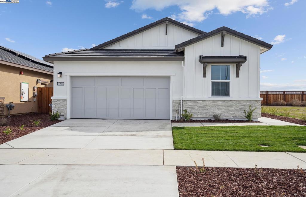 The perfect Getaway floorplan features a spacious owners suite and walk in closet. The gathering room joins the cafe for fun entertaining. The kitchen has a large island for family and friends to join you in the kitchen. Enjoy your private patio.
