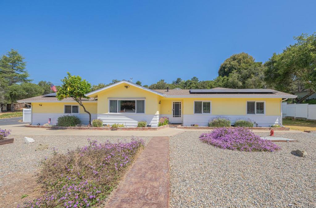 Welcome to your dream home at 18101 Berta Canyon Road in beautiful Salinas, CA! This lovingly cared for gem offers a perfect blend of comfort and transitional style. With 1,402 square feet of living space, you'll find three cozy bedrooms and two updated bathrooms that are ready to welcome you home. The heart of the home is the kitchen, thoughtfully updated with classic finishes that will inspire your inner chef. You'll love the primary bathroom, too, with its fresh, contemporary updates making it a soothing escape. Stroll through the house and notice the newer flooring and the fresh coat of paint that bring every room to life. Step outside into your own slice of paradise, over half an acre of fun and relaxation. Dive into the in-ground pool, unwind in the spa, or challenge your friends to a game on your very own bocci ball court. The fully owned solar panels, central forced air heating, ceiling fans, and double-pane windows ensure modern comfort and efficiency all year round. Whether you're entertaining or simply enjoying the serene surroundings, this home is all about outdoor living at its finest. Come and see for yourself, schedule a tour today!