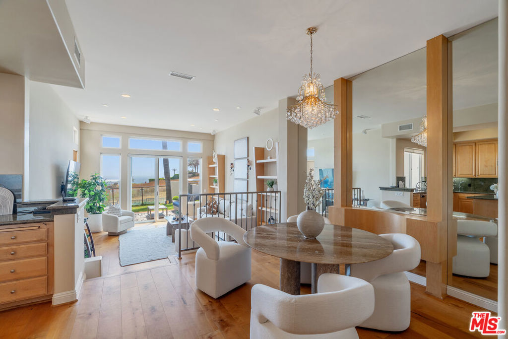 Experience the best of Malibu living in this front-row, turn-key townhome located in the coveted Vista Pacifica at Broad Beach community. Enjoy sweeping ocean views from both the spacious living room and the upstairs primary suite. This beautifully maintained residence features a gourmet kitchen outfitted with top-of-the-line stainless steel appliances, granite countertops, soaring ceilings, and an open-concept layout perfect for entertaining. Thoughtful upgrades include a built-in sound system throughout, custom cabinetry, a dedicated home office, elegant fireplaces, and an expansive walk-in closet. Take in breathtaking sunsets from your private ocean-view patio and balcony. This exclusive gated community offers resort-style amenities including a sparkling pool, relaxing spa, and fully equipped gym. Welcome to your dream coastal retreat--Malibu living at its finest.