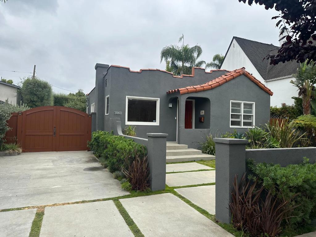 Now available for rent! This fully renovated 3-bed 2-bath 1930s Spanish Revival home blends original charm like wood floors, cove ceilings, and crown molding with modern upgrades, including a remodeled kitchen and bathroom. Enjoy a spacious master suite with patio access, great natural light, a private gated driveway, and a beautifully landscaped yard with open outdoor space perfect for relaxing or entertaining. Pets are allowed on a case-by-case basis. Note: - Current tenants in the property, please do not disturb