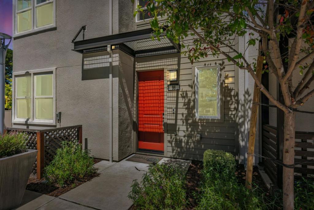 Welcome to this beautifully upgraded 4-bedroom, 3.5-bathroom modern townhome, ideally located in the heart of Fremont. This thoughtfully designed multi-level home features premium finishes and a functional layout perfect for families,/professionals/investors. Step inside to a spacious open-concept main level with engineered hardwood flooring, recessed lighting, and abundant natural light. The gourmet kitchen tastefully upgraded with granite countertops, custom full-height backsplash, shaker-style cabinetry, built-in SS appliances with gas range. Spacious primary suite includes a walk-in closet, a luxurious en-suite bathroom, dual vanities and a glass-enclosed shower. Two additional bedrooms share a full bathroom, and Ground floor bedroom with its own full bath offers a perfect guest room/ office/private in-law space. Upgrades includes Modern cabinetry/high-end fixtures, Updated bathroom vanities and tile flooring, central AC and much more, Attached 2-car garage with built-in storage, Private balcony plus front patio. Situated in a quiet, well-maintained community with low HOA , Top-rated Fremont schools, BART, HW 880 & 680, Tesla, shopping/dining at Pacific Commons and Fremont Hub. This turnkey home offers modern living in one of the Bay Area's most convenient locations.