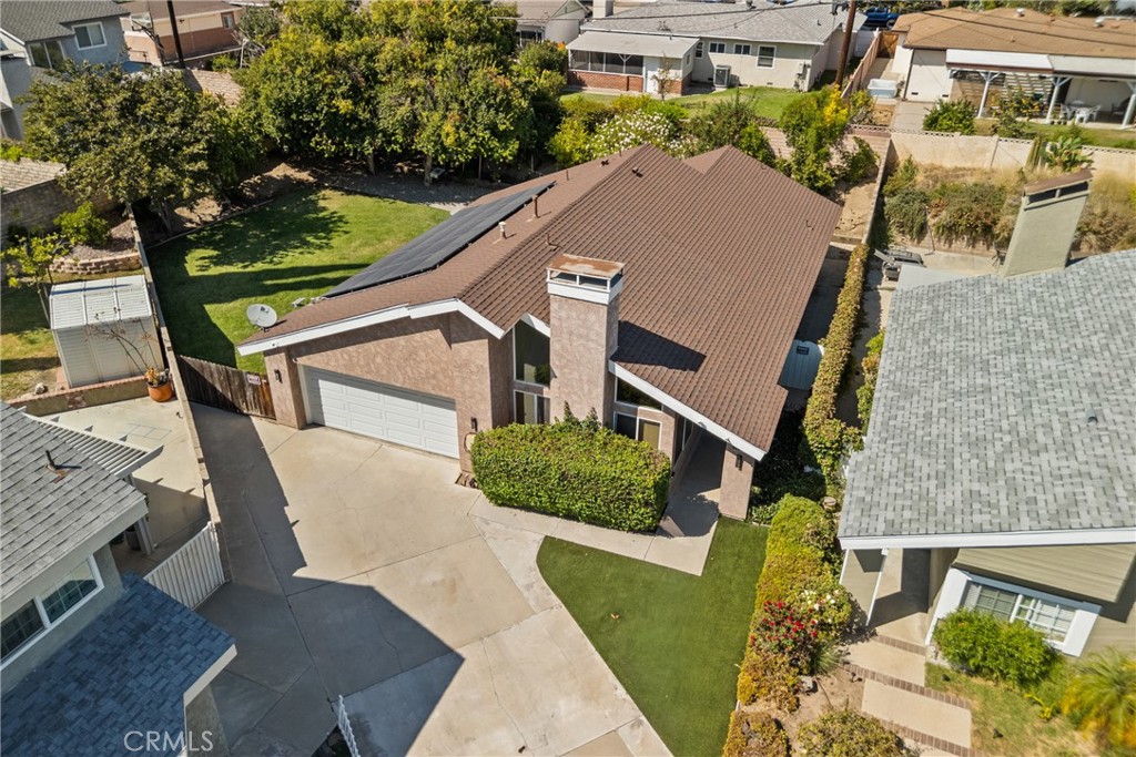 Beautifully updated and move-in ready, this Chatsworth gem sits on a private cul-de-sac offering peace and privacy. Pride of ownership shines throughout with recessed lighting, high ceilings, and double-pane windows that bring in natural light while keeping the home energy efficient. Recent upgrades include a brand-new A/C unit, brand-new garage system, brand-new tankless water heater, Brand new Electrical panel, and an EV charging port that stays with the home. The property also features solar panels for added savings and efficiency. Step outside to an expansive backyard, perfect for gardening, fruit trees, or entertaining, with outdoor lighting already installed to enjoy evenings under the stars. With tasteful updates, modern comforts, and an excellent layout, this well-kept home blends style and function in one of Chatsworth’s most desirable neighborhoods.