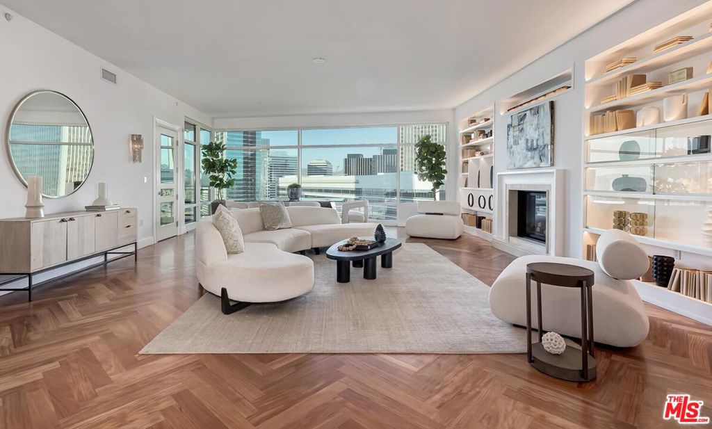 Welcome to Unit 17C at The Century, one of Los Angeles' most distinguished and sought-after full-service high-rise buildings. This stunning 3-bedroom, 4-bathroom residence offers expansive northeast-facing views of Century City, Beverly Hills, and Bel Air, making it a true standout. Upon entering, you're greeted by a spacious entry foyer that flows seamlessly into an open living area, where floor-to-ceiling windows capture the true essence of natural lighting during the day and the city lights at night. The gourmet kitchen features high-end appliances such as a Sub-Zero refrigerator, Viking oven and stove as well as sliding doors that open to your own private balcony. The spacious primary suite encompasses the entire East wing of the unit; it includes a balcony, walk-in closet and a beautifully designed primary bath with his & her sinks, walk-in shower and bath. The West wing houses two additional bedrooms, each with its own en-suite bathroom, along with a private laundry room for added convenience. Custom-designed and truly one of a kind, the unit offers exceptional storage with nine closets, including pantry, linen, coat, and two walk-in closets, maximizing the 3,280 sq. ft. of interior space. Additional features include a private concierge closet on the floor and a separate storage unit in the building. Designed by acclaimed architect Robert A.M. Stern, The Century sits on four beautifully landscaped acres and offers an unmatched array of 5-star amenities. Residents enjoy a state-of-the-art fitness center with private spa treatment rooms, a resort-style 75-foot lap pool with cabanas, a wine storage room, screening room, business center, children's playroom, private dining room, dog park, and exclusive on-site dining at Hinoki & The Bird. With 24-hour gated security, concierge service, and valet, The Century defines luxury, safety, and convenience.