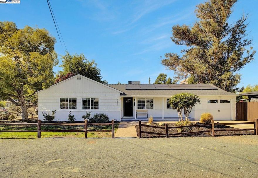 Absolutely charming 3 bd/2bath bungalow in one of Concord’s most convenient locations! Just blocks from Concord BART and Todos Santos Plaza in downtown Concord, where you’ll find endless shopping, dining, and a weekly farmers market. This home has been beautifully updated throughout - including leased solar for energy savings. The oversized kitchen features rich wood cabinetry, granite countertops, and stainless steel appliances.Solid oak hardwood floors run through the main living areas, complemented by brand-new carpet in the bedrooms. Both bathrooms have been tastefully updated with newer fixtures and stylish tile surrounds.  Step outside to your backyard oasis, complete with a custom overhang, lush greenspace, paver patio, and a custom Tuff Shed for extra storage. Don’t miss this one before it’s gone!