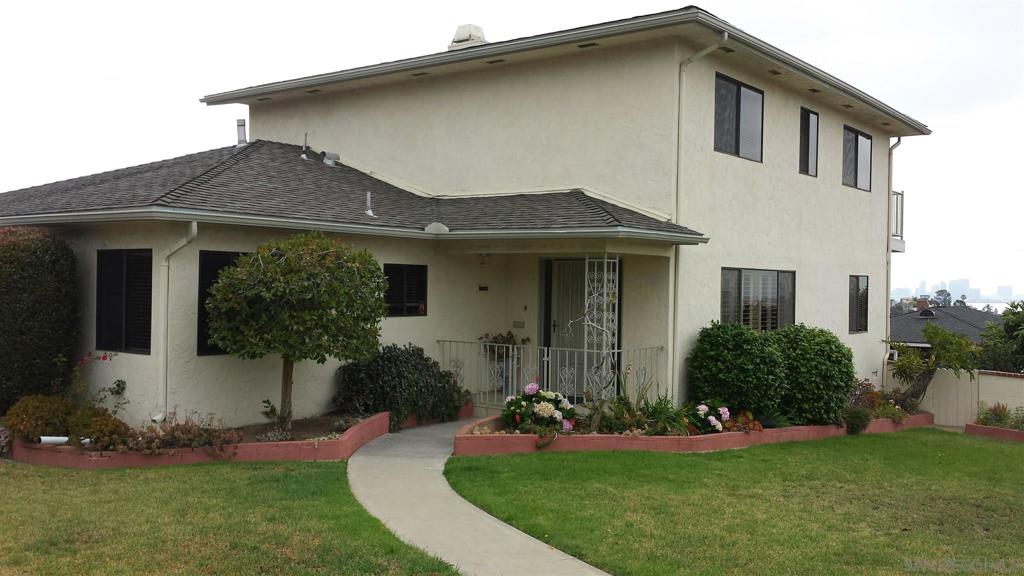 Wonderful large family home, centrally located in highly desired neighborhood of Point Loma/Ocean Beach with views of SD Bay & City skyline, Mission Bay/Sea World. 5 bedrooms/3 baths, living,dining and family rooms. Masterbedroom suite with private deck with view. Additional roof top deck perfect for entertaining, attached double car garage, plus workshop, shed & separate RVBoat parking. Large corner lot with plenty of yard to entertain and have vegetable garden - fruit trees included! Tenant pays all utilities. Rent includes weekly trash pick-up and gardener.