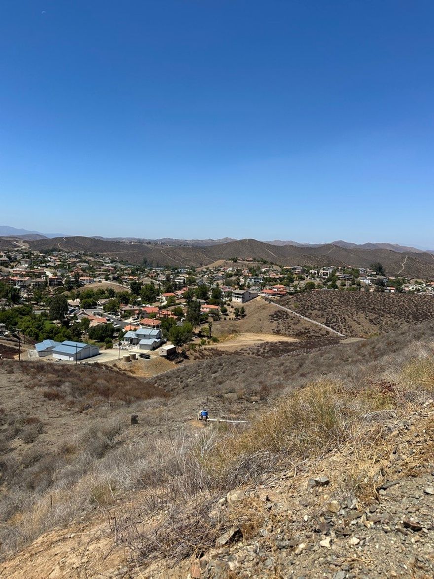 Rare opportunity to acquire two parcels totaling approximately 10.52 acres overlooking Canyon Lake, surrounding mountains, and nearby neighborhoods. These undeveloped lots are located near utilities and offer an excellent opportunity for a custom home, private retreat, or long-term investment with scenic views. One parcel with approximately 10.04 Acres, the Second Parcel with aproximately 0.48 Acres. Both Parcels Sold Together. 





Moratorium currently in effect. Buyer to verify all zoning, utilities, setbacks, and development potential with the City of Menifee and the County of Riverside.