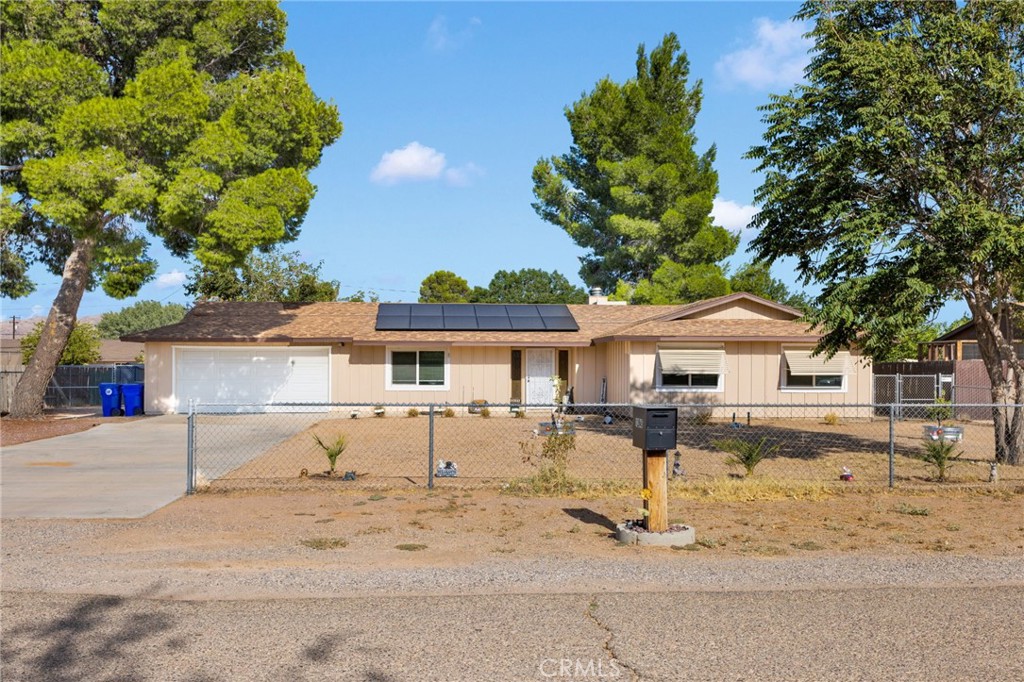 Welcome to this beautiful 3-bedroom, 2-bath home that combines comfort, functionality, and outdoor living! Inside, enjoy fresh new carpet and paint in most of the house, creating a clean and inviting atmosphere. The spacious master suite features a walk-in closet for added convenience and storage.
Step into the enclosed patio with many functions maybe even a 4th bedroom, game room or office! Enjoy your private backyard retreat. The fully fenced yard offers exceptional privacy and is packed with extras: a large gazebo lined with pavers, a greenhouse, fruit trees, two storage sheds, and double gates for easy access.
With paid-off solar panels, this home is energy-efficient and budget-friendly from day one.
Don't miss this move-in ready gem – ideal for relaxing, entertaining, and living your best life!
