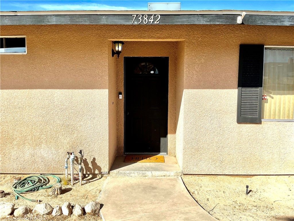 Photo of 73842 White Sands Dr, 29 Palms, CA 92277 (MLS # JT26053830)