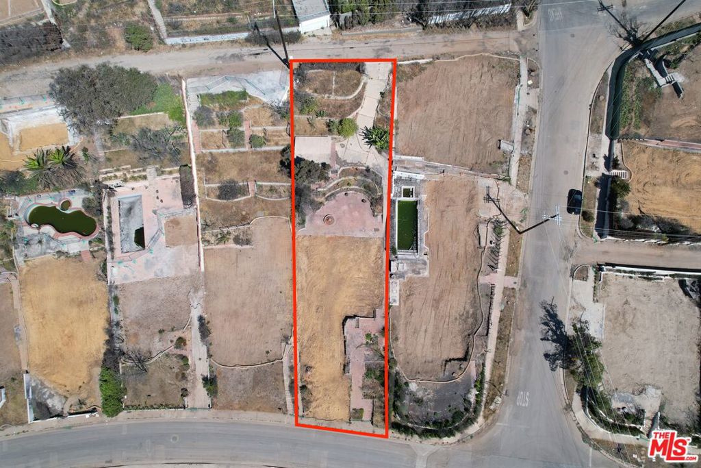 An exceptional opportunity to build new in one of the Palisades' most desirable locations - The Via Bluffs. Situated just three blocks from the Palisades Village, this 10,350 square foot lot offers a clean slate for your custom dream home, with ocean views from the top alley side. The previous 2,054 square foot residence was lost to fire, presenting a unique advantage for a streamlined redevelopment process. A rare chance to reimagine and rebuild in this sought-after coastal community.