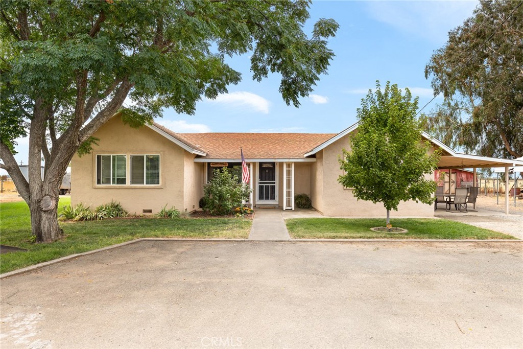 Welcome to your new Ranchette! This beautifully remodeled 3-bedroom, 2-bathroom home offers 1,580 sq. ft. of living space on a generous 6.23-acres with stunning views of the Sutter Buttes and surrounding areas. Step inside to find newer flooring, fresh paint, and updated finishes throughout. The living room features a cozy wood-burning stove. The kitchen offers ample storage space and flows seamlessly into the dining area. An indoor laundry room with washer and dryer hook-ups adds to everyday convenience. Outside, this property shines with everything you need for country living. You’ll find full RV hookups, a barn, one Old Hickory shed that will stay with the property, and a generous well. There is plenty of room for horses, livestock, gardening, or hobby farming. Enjoy the peaceful setting, mature trees, park like atmosphere, and wide-open space—perfect for creating your dream lifestyle.