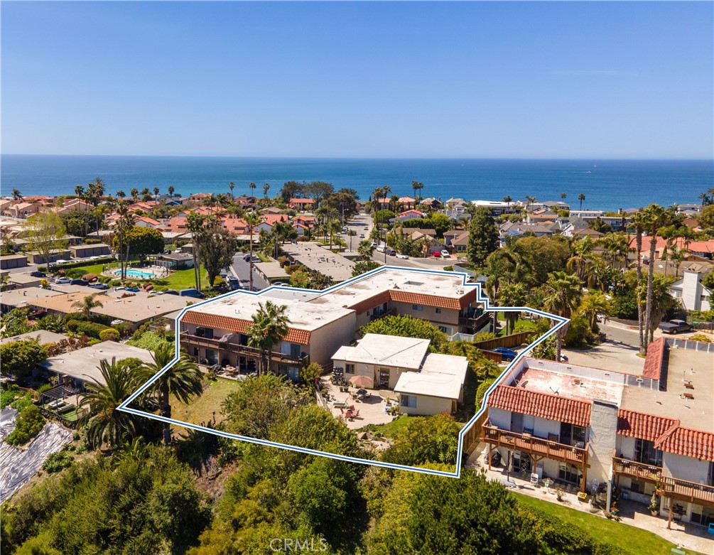 27512 Del Gado Road is a 10+1 unit multifamily investment property located in San Clemente, CA. 27512 Del Gado Road features a desirable mix of spacious one, two, and three-bedroom units across a 2-story apartment building and a single-story cottage which has been converted into a duplex. The property offers desirable amenities including ample garage and surface parking, ocean and golf course views (select units), private patios and balconies, and on-site laundry. 27512 Del Gado Road is ideally situated adjacent to the coveted Capistrano Beach neighborhood, an area renowned for its scenic coastline, relaxed atmosphere, and strong rental demand. Just minutes from world-class beaches, the San Clemente Pier, and the vibrant downtown corridor, this location offers a lifestyle that continues to attract long-term renters at premium rental rates. The property benefits from excellent connectivity via Interstate 5, Pacific Coast Highway, and local public transit, including the San Clemente Trolley. Additionally, the property is located just over one mile from San Clemente's Metrolink and Amtrak Station, providing convenient access throughout Southern California. Furthermore, residents enjoy walkable access to parks, surf breaks, coastal trails, and a range of boutique retail and dining options. This irreplaceable coastal location, coupled with limited multifamily inventory in the area, makes 27512 Del Gado Road a rare investment opportunity. The property is well-positioned to capitalize on continued renter migration toward lifestyle-oriented communities and the enduring demand for beach-adjacent housing in Southern Orange County.