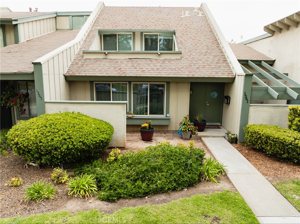 Don't miss out on this one in the popular lakeside community, the highly sought after Village Grove.This resort-style community has amenities galore and everything is maintained for you. Easy-living lifestyle with exclusive scenic lake privileges where you can paddle boat and splash all year long. Year-round recreation that includes sport courts, pools, barbecue, clubhouse, hiking and biking trails, basketball and tennis. Plenty of things to keep you busy without the headache of maintenance. Village Grove is also conveniently located with easy access to the 91 freeway without driving through downtown Corona, saving time and stress. This home is turnkey has been updated from top to bottom starting with new windows. The gourmet kitchen has been completely renovated with tons of crisp white cabinets, gorgeous granite countertops and flanked by stainless steel appliances. And the refrigerator stays! The 10 foot island provides plenty of seating and dining space. Storage is not an issue as the island has storage doors on both sides as well as extra cabinets on the wall. Both bathrooms are gorgeous! New cabinets, custom tile and new fixtures complete that checklist. No carpet here! There is new flooring throughout as well as fresh neutral paint. Inside laundry and washer and dryer are included. Create your own private oasis on the back patio which leads to the two car garage with plenty of space for storing all your toys! BONUS - New water heater and energy-efficient AC unit recently installed.