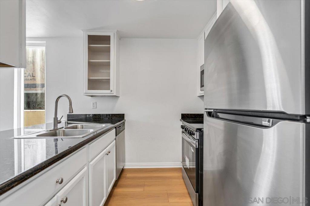 Experience modern comfort and style in this beautifully renovated 1-bedroom, 1-bath condominium located in a prime location of San Diego. This turnkey residence features brand-new laminated flooring in the kitchen, living room, dining room, and bathroom, paired with new plush carpet in the bedroom for added comfort. The kitchen, living room, and bathroom cabinets have been freshly painted, offering a crisp and contemporary aesthetic. Additional updates include new light fixtures, a new kitchen sink, modern water fixtures, and fresh interior paint throughout. The kitchen is equipped with brand-new appliances, creating a stylish and functional space for everyday living. Located in a well-maintained community, this home is close to shopping, dining, coffee shops, fitness centers, parks, and schools. Its prime location offers easy access to major freeways, making for a quick commute to Downtown San Diego, Mission Valley, and the city’s iconic beaches. Whether you’re a first-time buyer, downsizing, or searching for an investment opportunity, this move-in-ready condo offers a perfect combination of style, comfort, and convenience.