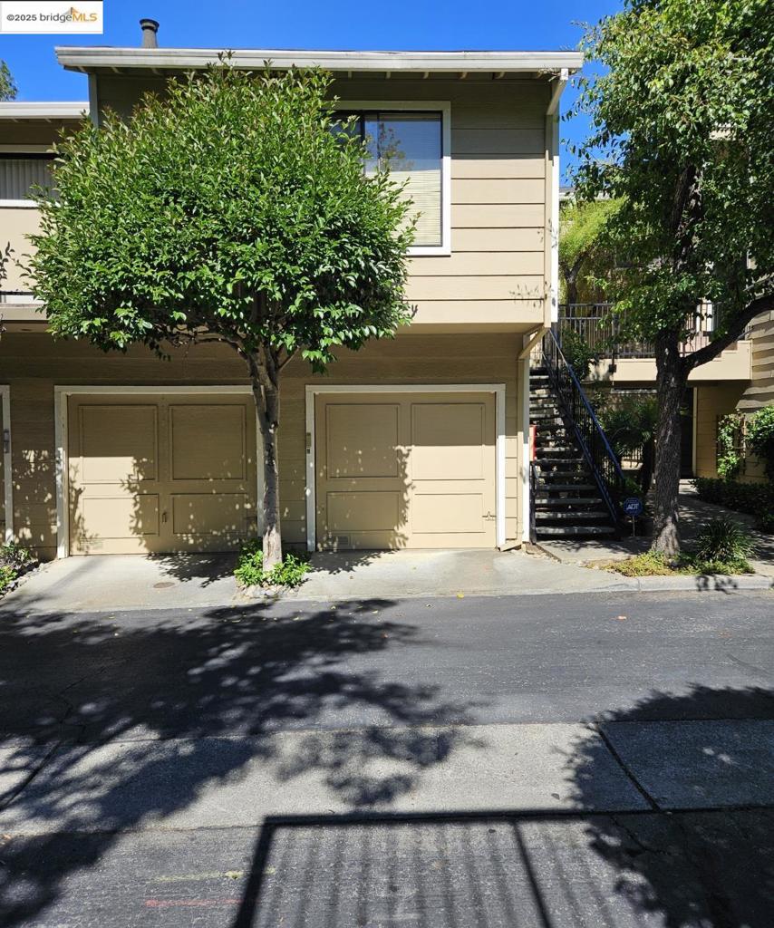 Natural Beauty and an Exceptional Opportunity: Own this one-bedroom, one-bath 787 sqft condo, located in Hayward Hills, renowned for its scenic beauty and nature escapes, a truly remarkable real estate opportunity for those who seek a blend of tranquil suburban living and urban accessibility. This condo, nestled amid the rolling vistas, features an open-concept floor plan between the living, formal dining, and kitchen areas, vaulted ceilings, a cozy wood-burning fireplace, in-unit laundry that includes a washer and dryer, stainless steel appliances, a one-car garage with remote access and extra storage space, and a large, private balcony in an area with beautifully landscaped courtyards and gardens. This condo is conveniently located near guest parking, the community pool and a hot tub, along with exceptional connectivity throughout the Bay Area to major highways (Interstate 880 and 580), BART, the Oakland International Airport, just a short drive away, and in close proximity to Cal State University, East Bay. Living in Haywood Hills offers the best of both worlds, minutes away from a variety of local shops and eateries coupled with walking trails and well-maintained parks. Whether you are a first-time homebuyer or an investor, this property presents an irresistible invitation.