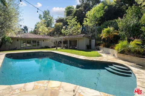 Photo of 105 N Glenroy Avenue, Los Angeles, CA 90049 (MLS # 26852145)