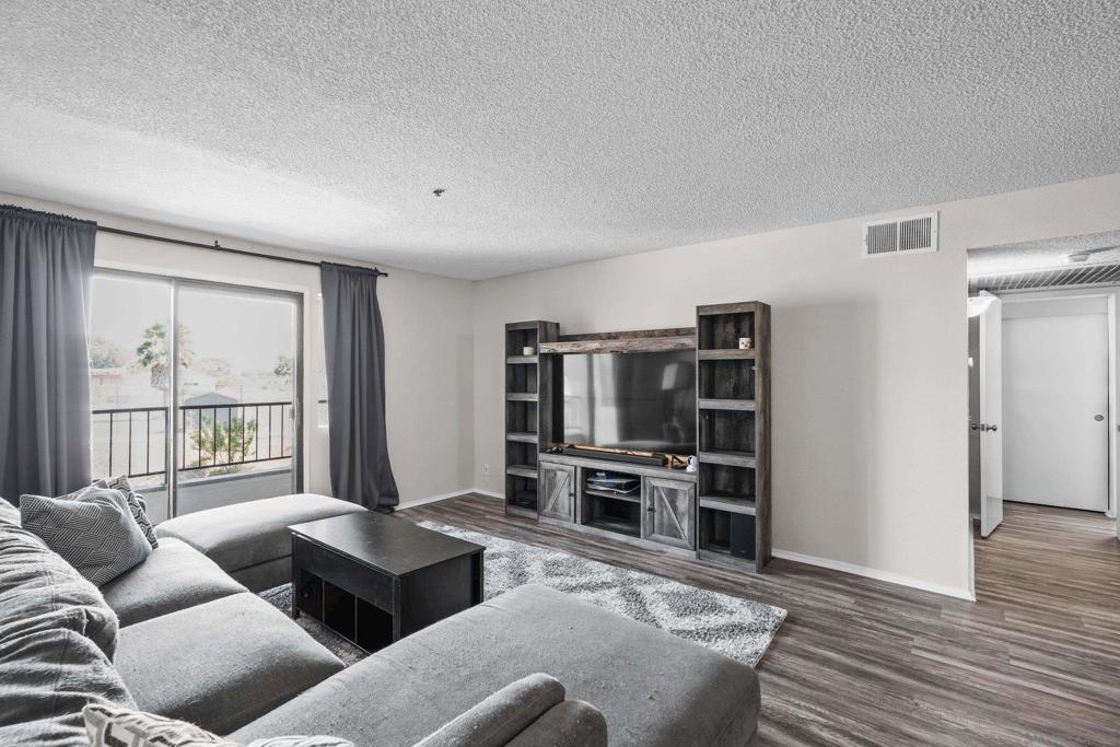 Rare VA Loan Assumption Opportunity! Secure this 2 bed, 2 bath, 1,134 sq ft condo in the peaceful Sunrise Point community with an assumable 5.75% VA loan and a minimal equity gap - a unique chance to lock in a lower interest rate in today’s market. This well-designed home features dual primary suites, each with its own full bathroom, offering privacy and flexibility for roommates, family, or guests. The bright living area opens to a private balcony with neighborhood views, perfect for morning coffee or evening relaxation. Enjoy the convenience of in-unit laundry and two assigned underground parking spaces. Located in the tucked-away El Cerrito area, this property offers quick access to SDSU (under 10 minutes), downtown and military bases (about 15 minutes), plus shopping and dining just a short walk away. Whether you’re active-duty military, a veteran, or simply looking for a smart buy with built-in value, this home delivers location, convenience, and a financing advantage you won’t find every day.