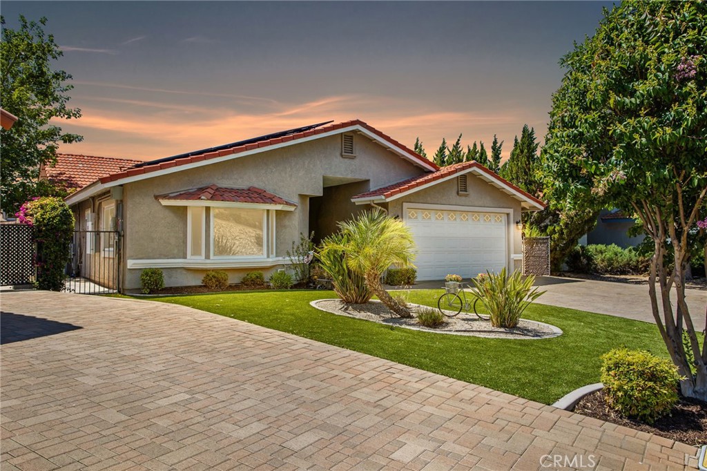 Welcome to this meticulously maintained, FULLY REMODELED WATERFRONT home offering 3 bedrooms, 2 bathrooms, and 2,339 sq ft of beautifully upgraded living space. From the moment you step inside, you’ll appreciate the open layout, vaulted ceilings, wood-look porcelain tile throughout the main living areas, custom designer paint, crown molding, dual-pane windows and sliders, and ceiling fans throughout. This home was almost completely redone in 2021 by Tutt renovations. The family room boasts vaulted ceilings, a custom built in cabinet with media storage, a wood burning fireplace with a stylish quartz and shiplap back wall and mantle. Both roomy secondary bedrooms and have ample closet space. The front room is light and bright featuring a pop out window, perfect for reading, and a small desk nook. The shared bathroom is delightful, with dual sinks and a modern step in shower. The spacious primary suite has a water view and is conveniently located away from the other bedrooms, 3 closets, a slider leading to the patio and the spa-like bathroom features a wet room shower, soaking tub and dual sinks. The home also includes a laundry room with a sink, granite countertops and abundant storage. The kitchen was fully remodeled down to the studs in 2014 and features soft-close cabinetry, a large island with power, quartz countertops, and a brand new built-in microwave. Outside, enjoy an expansive covered patio with a firepit and four retractable sunshades, multiple seating areas, cemented side yard and dog run, tiered planters, and a private dock with hydro hoist that can accommodate a Pontoon or Tritoon boat, steel canopy, TREX decking and day/night solar lights. Additional upgrades include paver driveway and walkways (2024), NEW turf lawn, 26 solar panels (2024 PPA) with 19.5kWh backup battery, NEW electric panel, 220 installed for EV charging, fiber optic internet and extra storage and cabinet space in the garage. Situated on a tranquil part of the lake with peaceful views across to Lion’s Park and mature landscaping, this move-in-ready home is a rare gem! Canyon Lake is a 24 hour guard gated community with a private 525 acre lake, premiere wakeboarding and waterskiing, 18 hole SCGA rated golf course, Lakefront pool and clubhouse, Lakefront RV park, Equestrian center, tennis, basketball & pickleball courts, baseball fields, 4 beaches, 9 parks, an amphitheater, docks, a bicycle pump track, Senior Center, over 40 clubs to join and so much more!