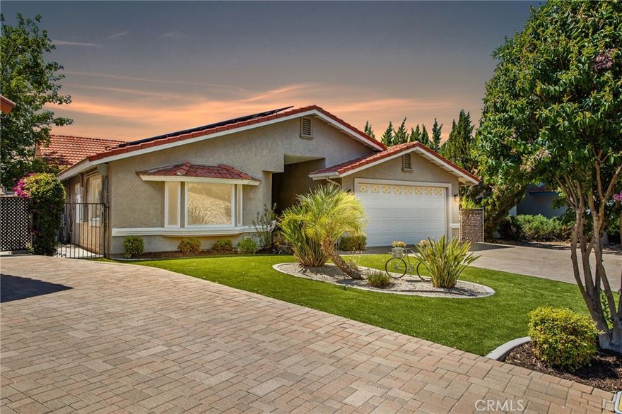 Welcome to this meticulously maintained, FULLY REMODELED WATERFRONT home offering 3 bedrooms, 2 bathrooms, and 2,339 sq ft of beautifully upgraded living space. From the moment you step inside, you’ll appreciate the open layout, vaulted ceilings, wood-look porcelain tile throughout the main living areas, custom designer paint, crown molding, dual-pane windows and sliders, and ceiling fans throughout. This home was almost completely redone in 2021 by Tutt renovations. The family room boasts vaulted ceilings, a custom built in cabinet with media storage, a wood burning fireplace with a  stylish quartz and shiplap back wall and mantle. Both roomy secondary bedrooms and have ample closet space. The front room is light and bright featuring a pop out window, perfect for reading, and a small desk nook. The shared bathroom is delightful, with dual sinks and a modern step in shower. The spacious primary suite has a water view and is conveniently located away from the other bedrooms, 3 closets, a slider leading to the patio and the spa-like bathroom features a wet room shower, soaking tub and dual sinks. The home also includes a laundry room with a sink, granite countertops and abundant storage. The kitchen was fully remodeled down to the studs in 2014 and features soft-close cabinetry, a large island with power, quartz countertops, and a brand new built-in microwave. Outside, enjoy an expansive covered patio with a firepit and four retractable sunshades, multiple seating areas, cemented side yard and dog run, tiered planters, and a private dock with hydro hoist that can accommodate a Pontoon or Tritoon boat, steel canopy, TREX decking and day/night solar lights. Additional upgrades include paver driveway and walkways (2024), NEW turf lawn, 26 solar panels (2024 PPA) with 19.5kWh backup battery, NEW electric panel, 220 installed for EV charging, fiber optic internet and extra storage and cabinet space in the garage. Situated on a tranquil part of the lake with peaceful views across to Lion’s Park and mature landscaping, this move-in-ready home is a rare gem! Canyon Lake is a 24 hour guard gated community with a private 525 acre lake, premiere wakeboarding and waterskiing, 18 hole SCGA rated golf course, Lakefront pool and clubhouse, Lakefront RV park, Equestrian center, tennis, basketball & pickleball courts, baseball fields, 4 beaches, 9 parks, an amphitheater, docks, a bicycle pump track, Senior Center, over 40 clubs to join and so much more!