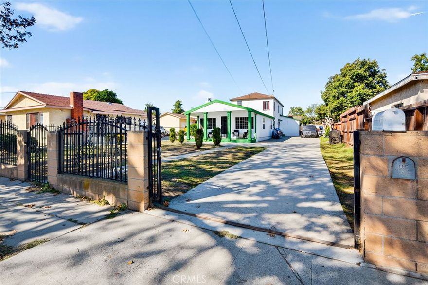 With over 2,600 square feet of flexible interior space, opportunity truly awaits! This duplex was turned into a large single family residence, with the easy potential to be switched back into a duplex or more! 1803 E 109th Place not only offers its own potential rental income, but it also offers an over 7,600+ sq. ft. lot with additional ADU potential, multi-car parking and or RV/ boat parking etc.. The home currently features 6 bedrooms, 2 bathrooms, and 1 additional bonus room, offering endless possibilities for a home office, gym, guest suites or even possible expansion into another unit! The original duplex offered two - two bedroom, one bathroom units. One upstairs, and one downstairs. Bring your vision and a plans to make it your own!