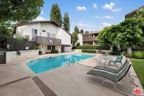 Photo of 14960 Victory Boulevard #101, Van Nuys, CA 91411 (MLS # 26103294)