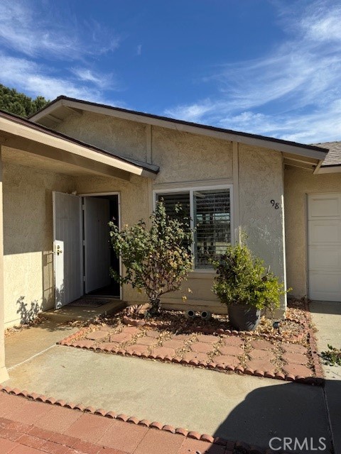Here is your opportunity to own this adorable home in the 55+ community of Peacock Valley in Banning. Featuring 2 bedrooms and 1 bath, the first thing you'll notice about this home is the wonderful lights that streams in, beautiful laminate flooring throughout (no carpet!!), and shutters on some windows. The front yard is nicely landscaped and there's a large, fenced in back yard with stunning mountain views for your enjoyment. The covered patio out back also allows you to enjoy the shade and cool breeze while taking in the scenery. This home has all the convenience and charm you need for everyday living. Located within minutes of the shopping centers in Beaumont, you are also close to the hospital and urgent care centers as well. Just a few minutes drive gets you access to the 60 or 10 Freeways, Morongo Casino and Spa, Cabazon and Desert Hill Premium Outlet Malls, as well as a multitude of dining options in Palm Springs. With a low low annual HOA and low maintenance for upkeep, this is definitely the place to call home, so send in your offer with request to see it today, you won't regret it!