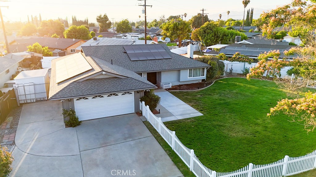 Welcome to Your Dream Home with a Big Yard and White Picket Fence!
If you’ve always dreamed of a charming home with space to roam, this stunning 4-bedroom, 3-bath pool home is the one! Situated on an expansive lot with RV parking, it also features a versatile She Shed—perfect as a home office, studio, or retreat. Step inside to discover a beautifully remodeled modern farmhouse with a warm, moody style. The open-concept layout highlights a custom-built entertainment center and cozy fireplace in the family room, ideal for gatherings and everyday living. The kitchen has been fully upgraded with a large center island, sleek new appliances, and designer finishes that any home chef will love.All bathrooms have been tastefully remodeled, and the bedrooms offer generous space for family or guests. Recent improvements include a new roof and new A/C unit—both just two years old—as well as owned solar panels (buyer to assume loan), fresh interior paint, luxury vinyl plank flooring, and updated pool plaster and equipment. The beautifully landscaped yard features new sod and a new sprinkler system, offering a lush, green space ready for relaxation or entertaining.Conveniently located near schools, shopping, and commuter-friendly freeways, this home checks every box. Don’t wait—schedule your private tour today and make this picture-perfect property yours!