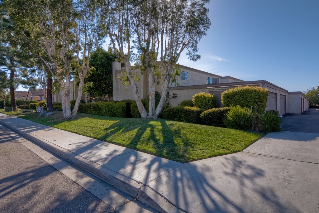 Located in a small complex on a quiet street in Mira Mesa is this great 2 BR townhome. Set in a park-like courtyard, it's one of the nicest in the complex. Features include an open layout on the 1st level with laminate floors, fireplace, a remodeled kitchen, and a half bathroom. Access to the large, attached 2 car garage and private patio is also on this level. Upstairs are the master bedroom with balcony, bath with remodeled shower and jetted tub, and 2nd BR. Popcorn recently removed and freshly painted. Neighborhoods: Mira Mesa Equipment: Dryer, Washer Other Fees: 0 Sewer: Sewer Connected Topography: LL