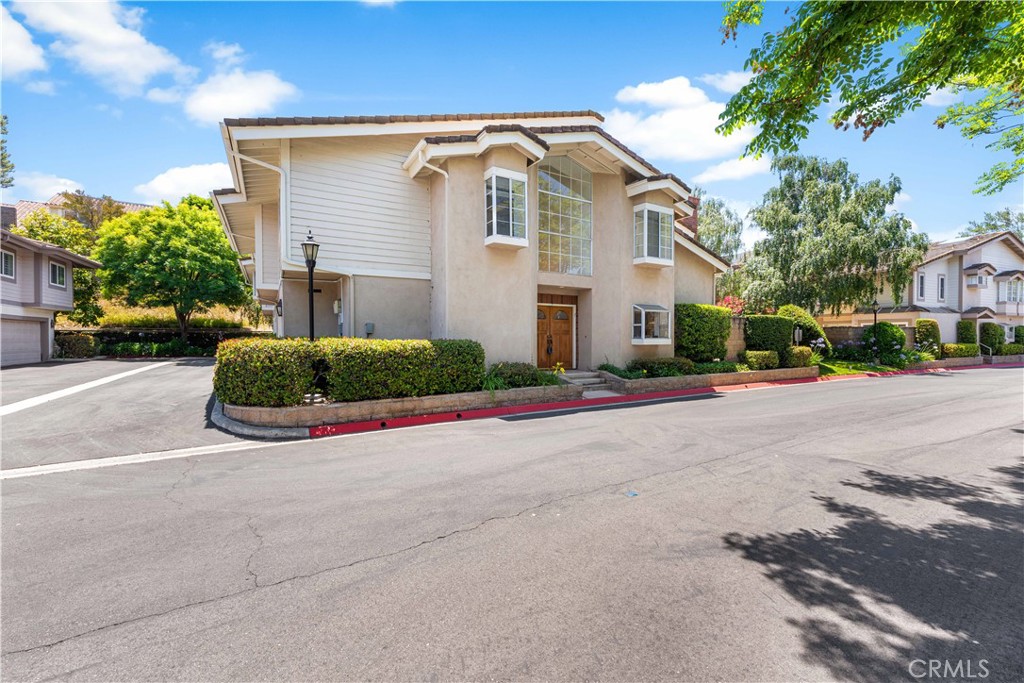 Incredible opportunity to own this spacious end-unit townhouse in the desirable Lynn Meadows community offering 3 bedrooms, 2.5 bathrooms, and 2,117 square feet of well-designed living space. Built in 1990, the home features a bright and open layout with high ceilings, a cozy fireplace in the family room, and a dining area perfect for entertaining. The attached two-car garage provides direct access for added convenience. Recent upgrades include a brand-new HVAC system, ensuring year-round comfort and improved energy efficiency, as well as fresh, plush carpeting installed throughout the home, offering a clean, modern feel. This home blends comfort, style, and functionality in one of Thousand Oaks’ most sought-after gated communities.
